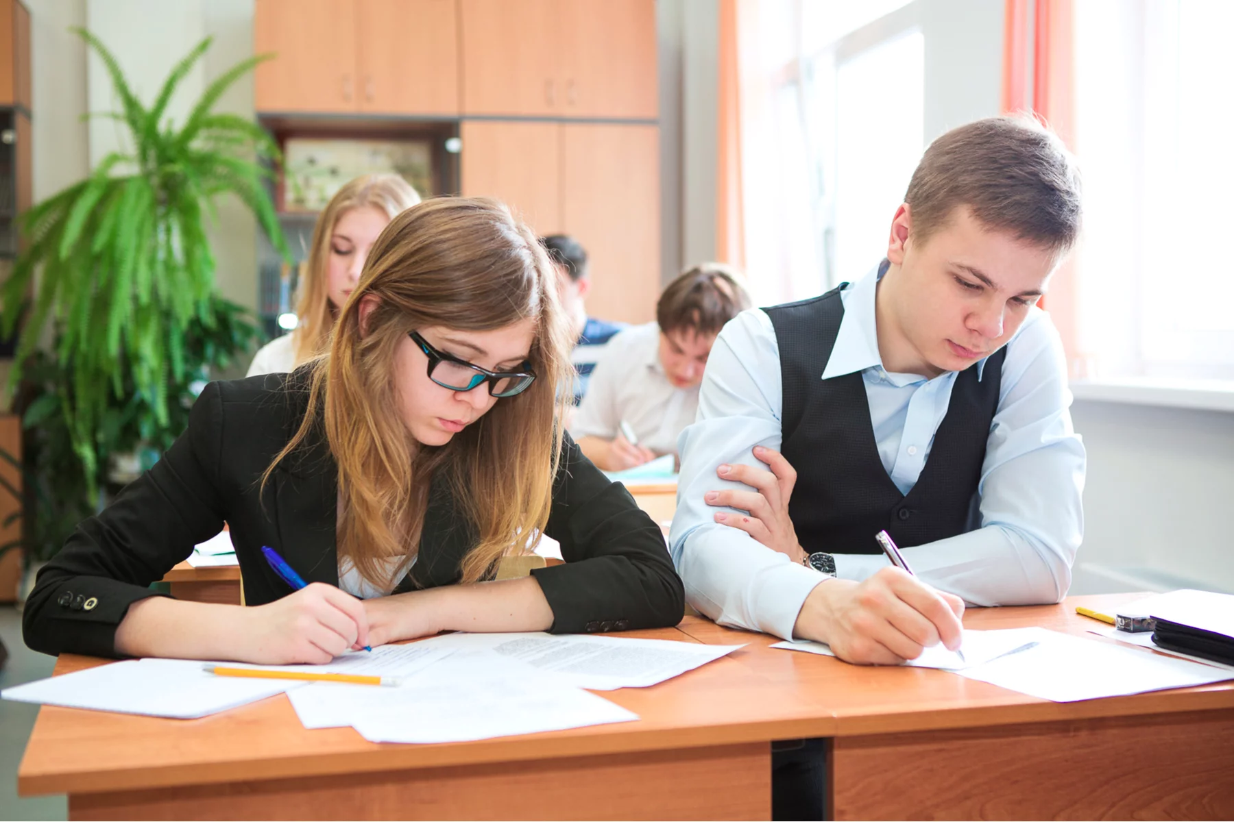 Secondary school students in Russia writing an exam