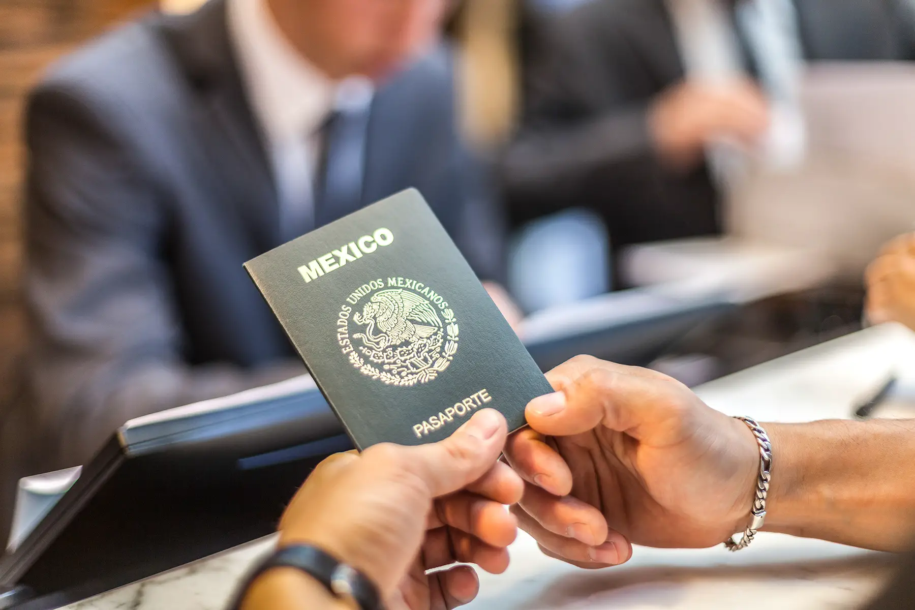 Traveler holding a Mexican passport