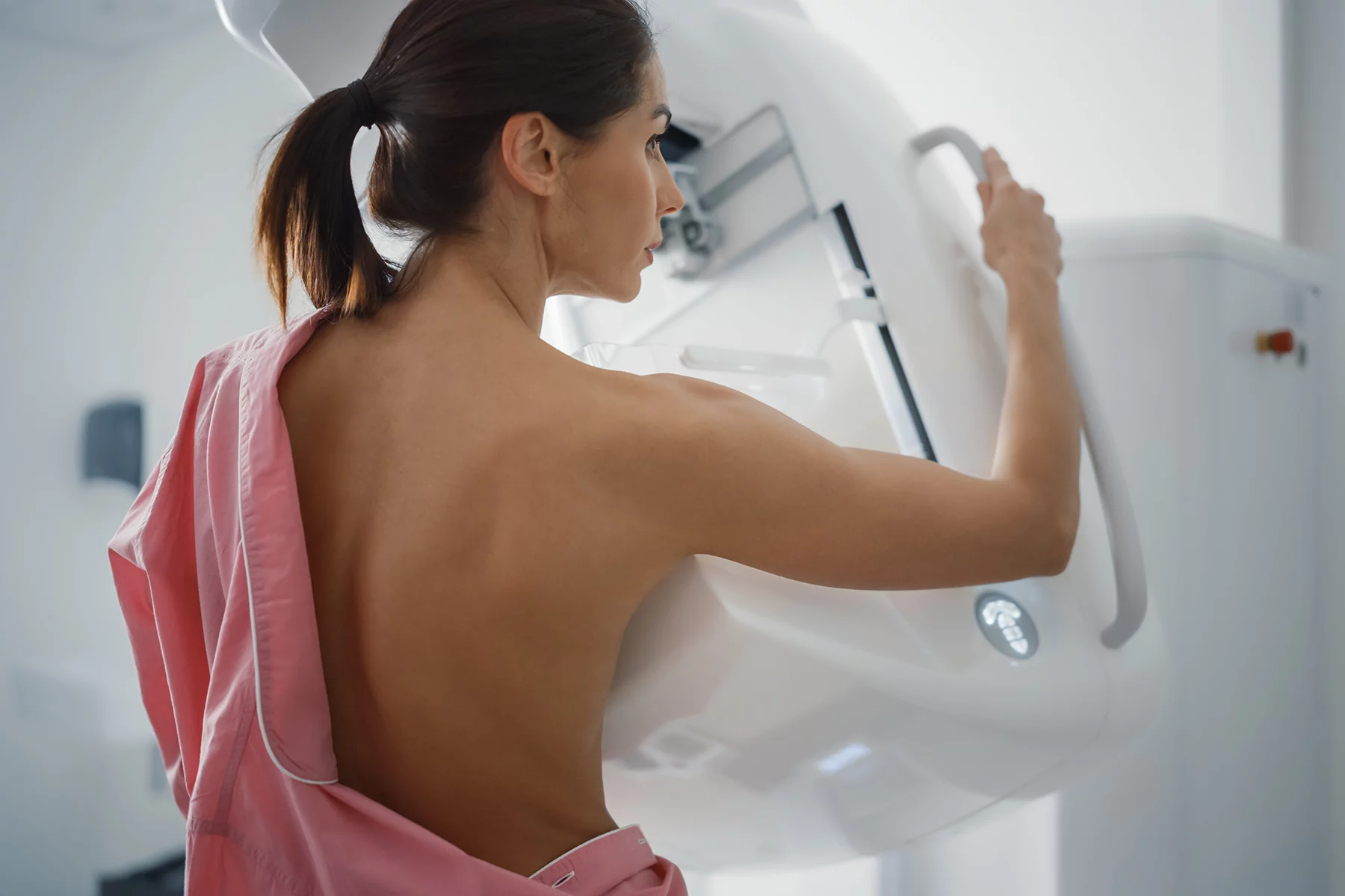 Woman undergoing a scan for breast cancer