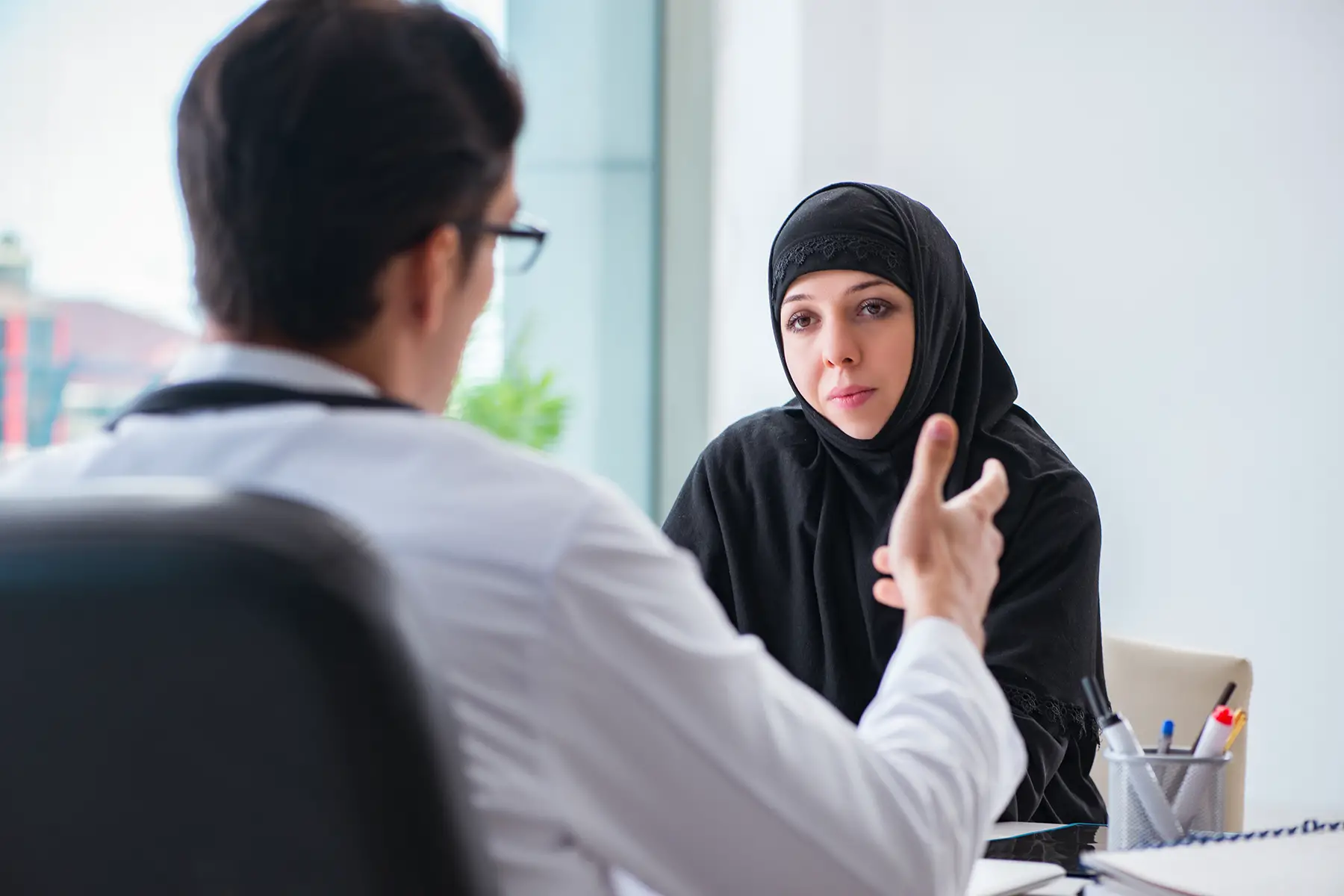 Woman visiting a doctor in Saudi Arabia
