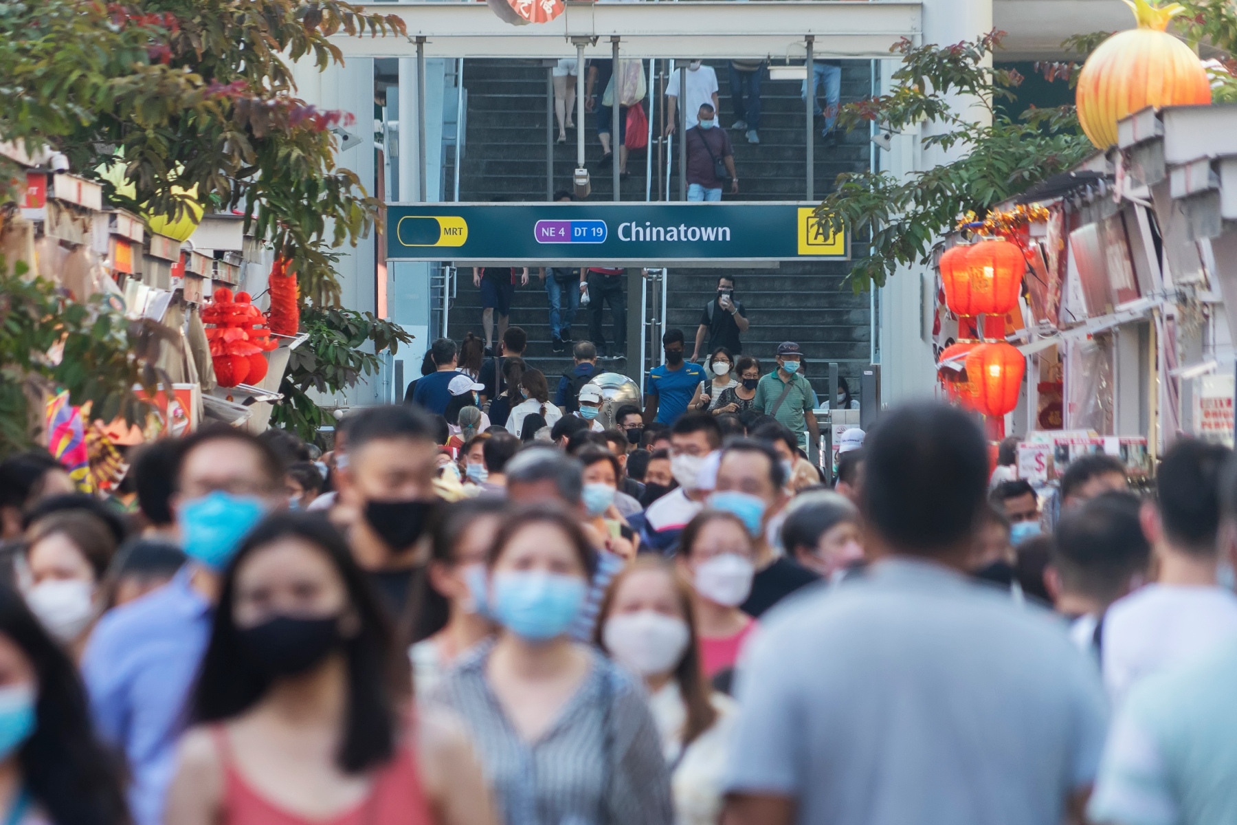 Crowds walking through Chinatown in Singapore