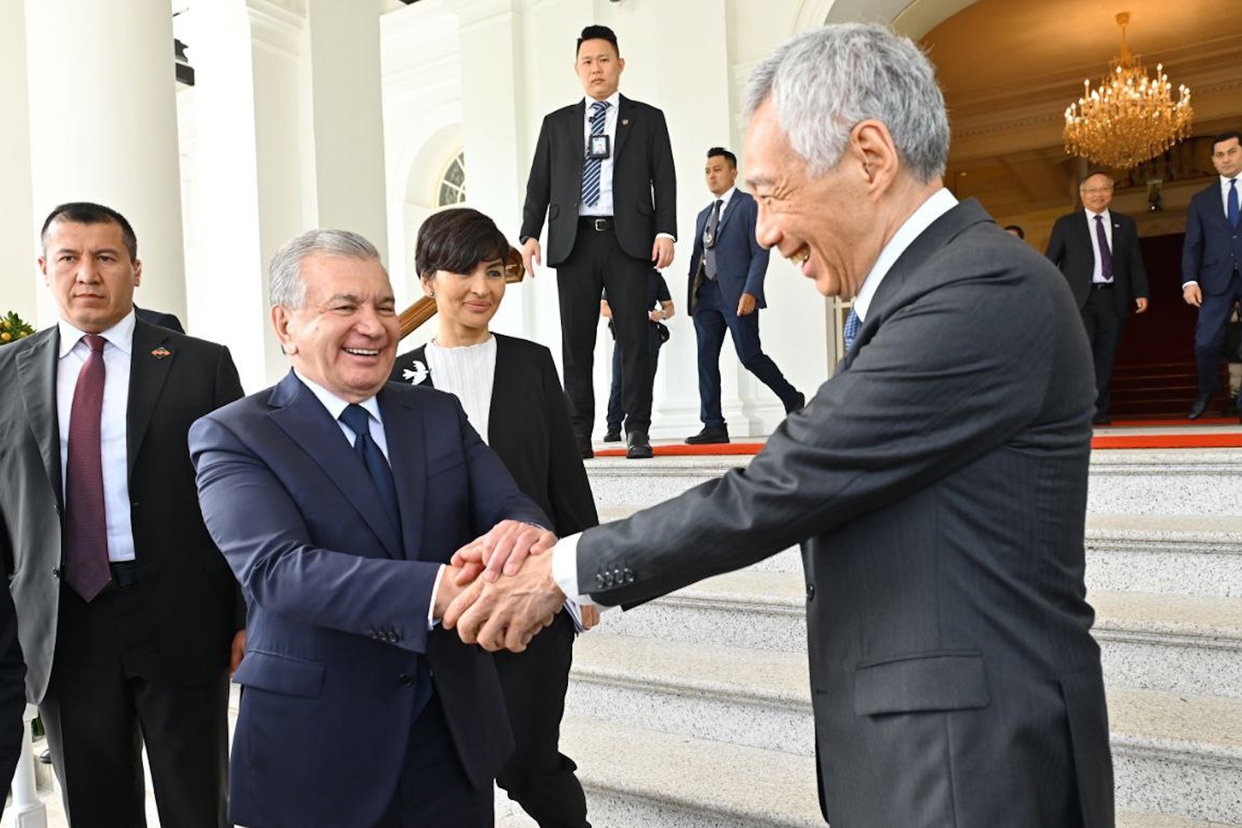 President of Uzbekistan Shavkat Mirziyoyev shaking hands with Prime Minister of Singapore  Lee Hsien Loong