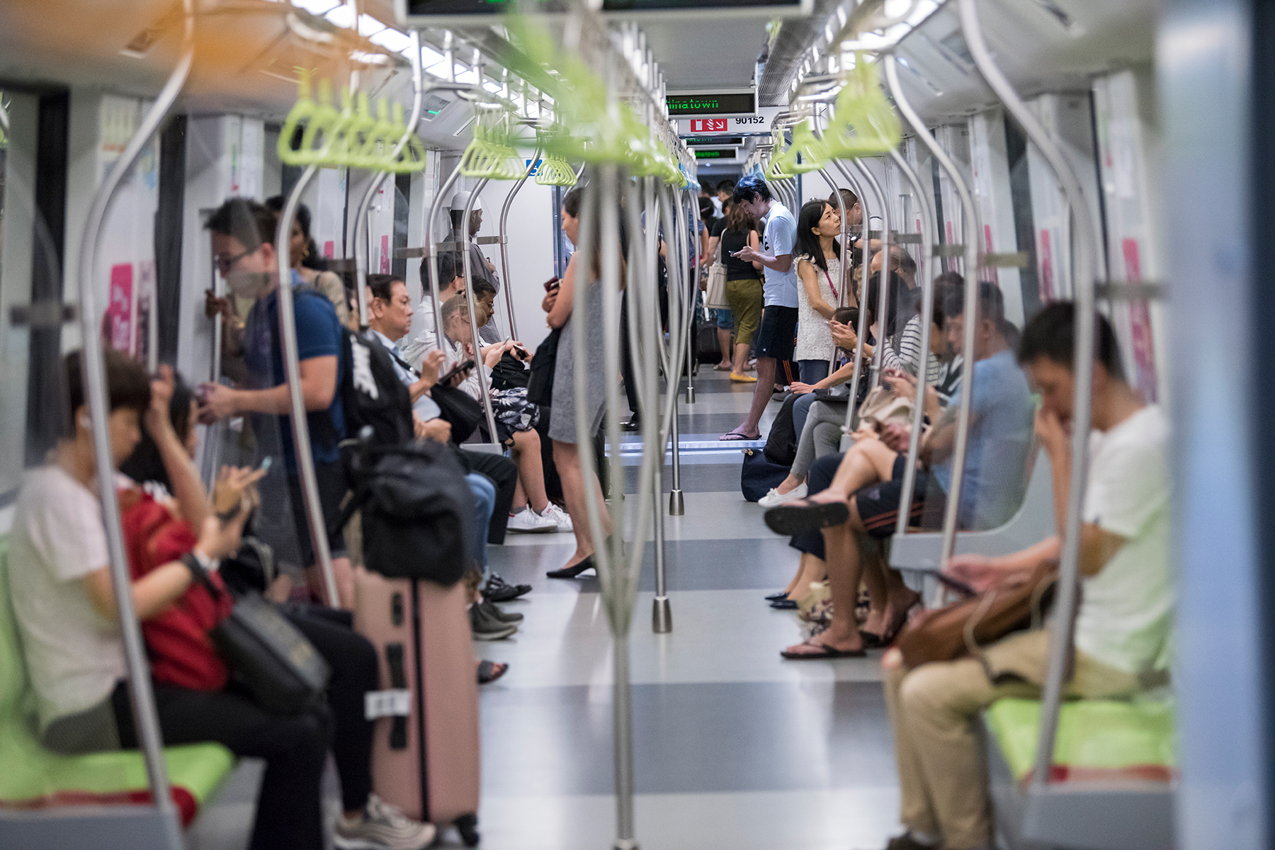People sitting in an MRT train