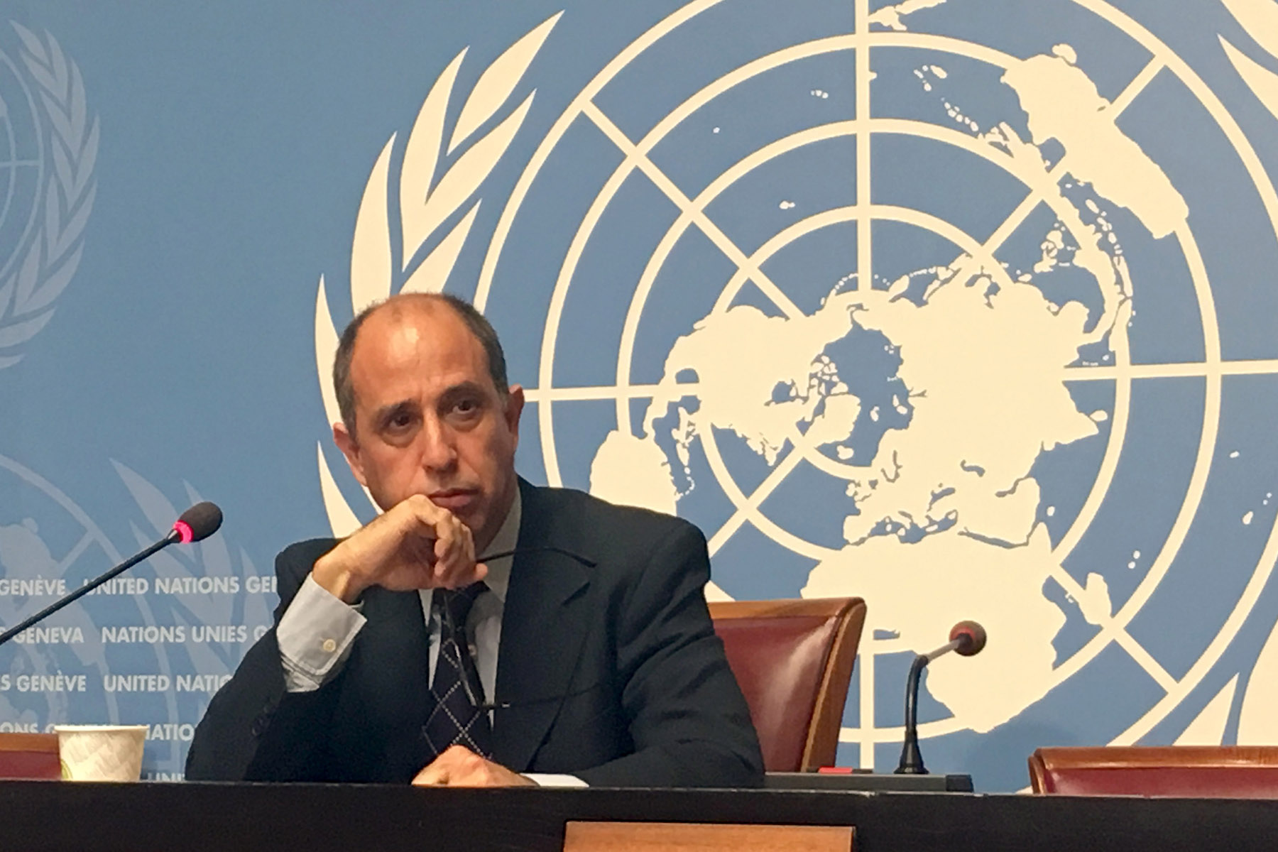 UN special rapporteur Tomas Ojea Quintana stares to someone behind the camera during a 2018 summit of the UN.