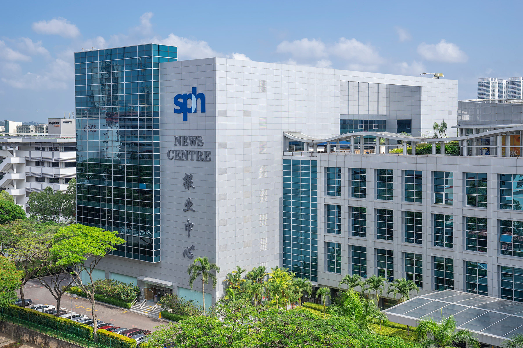 SPH News Center building – a modern concrete building with a glass edifice.