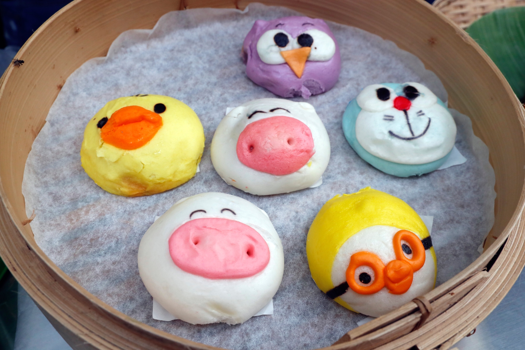 Steamed buns decorated as popular cartoons in Singapore's Chinatown