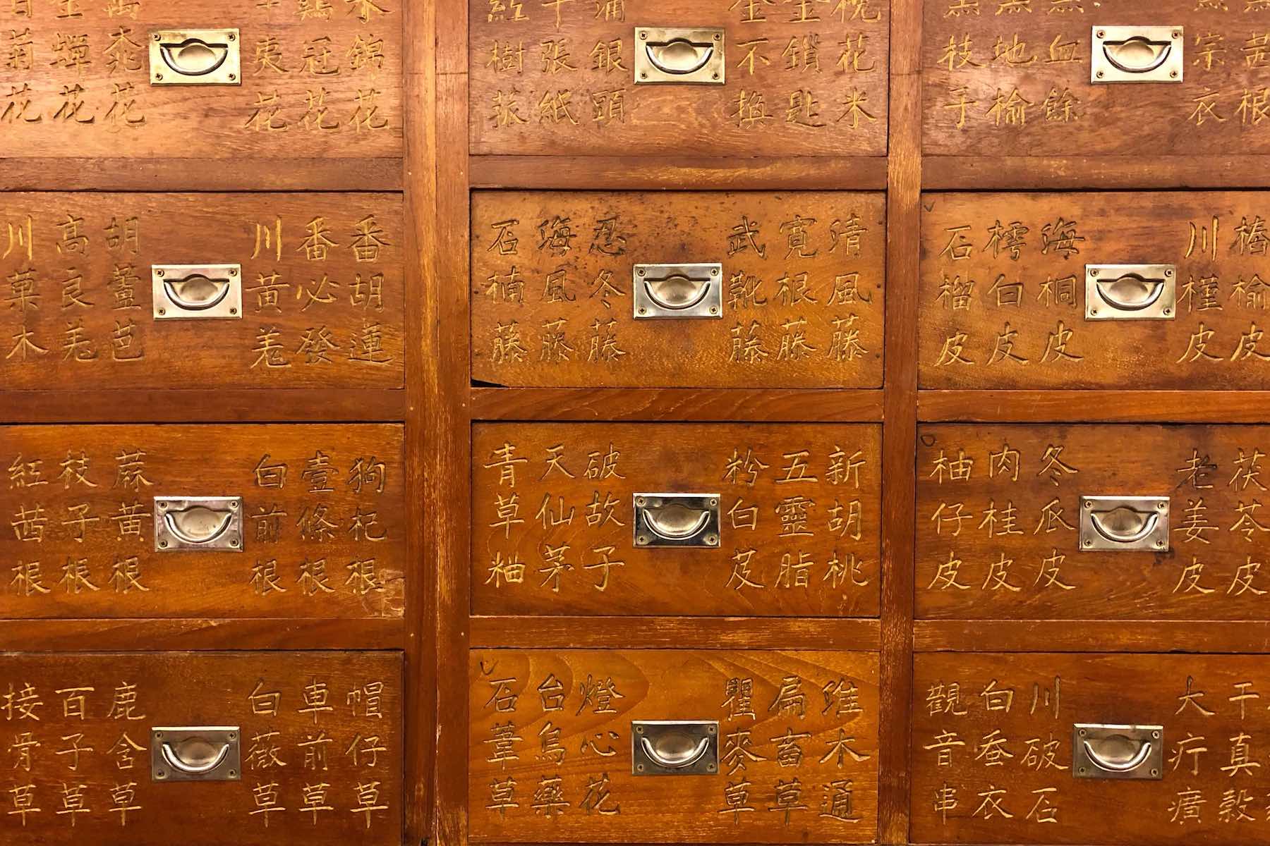 A close-up view of the medicine chest of a Traditional Chinese Medicine doctor
