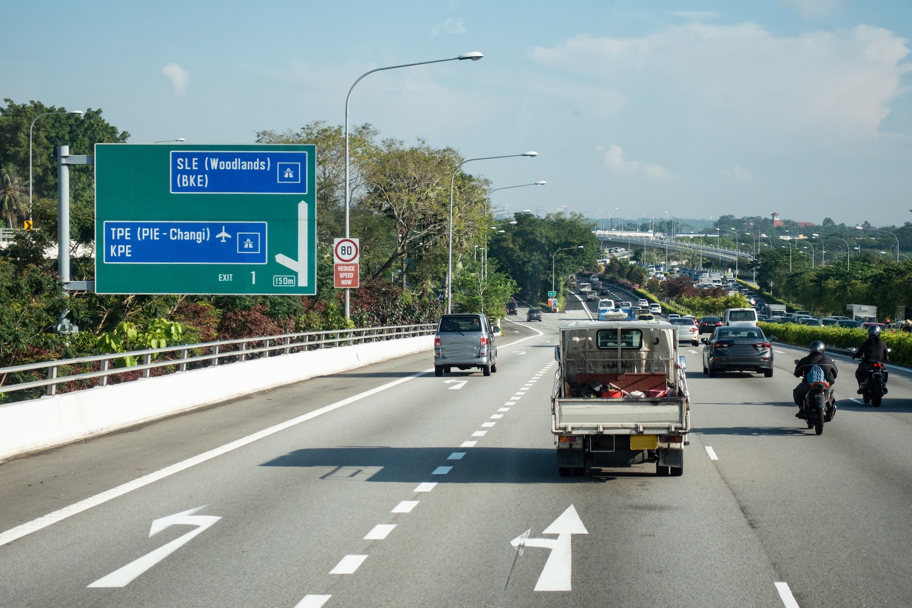 Singapore Central Expressway, Ang Mo Kio, Singapore. The right lanes are main lanes of highway, and the left way is to Changi Airport via TPE.

