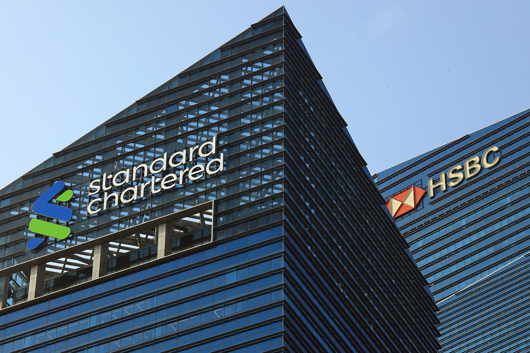 Signage of the Standard Chartered Plc and HSBC Holding Plc in Marina Bay, Singapore.