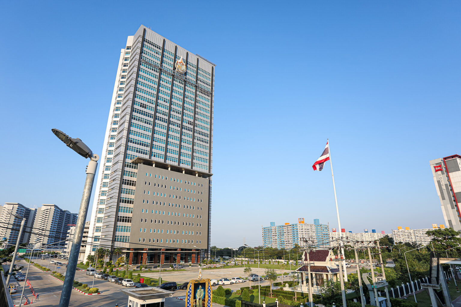 Royal Thai Police Immigration Bureau Headquarters - tall skyscraper on a sunny day