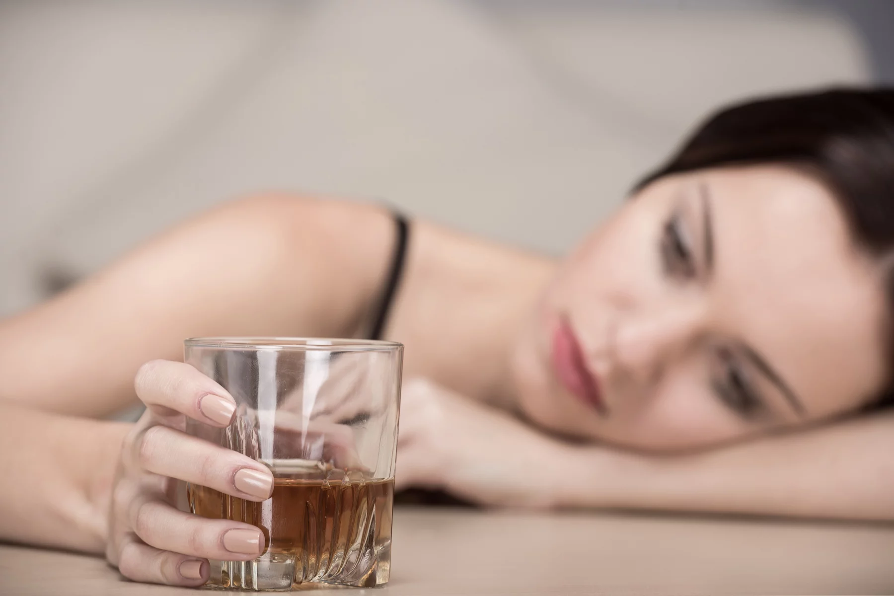 a woman struggling with alcohol addiction