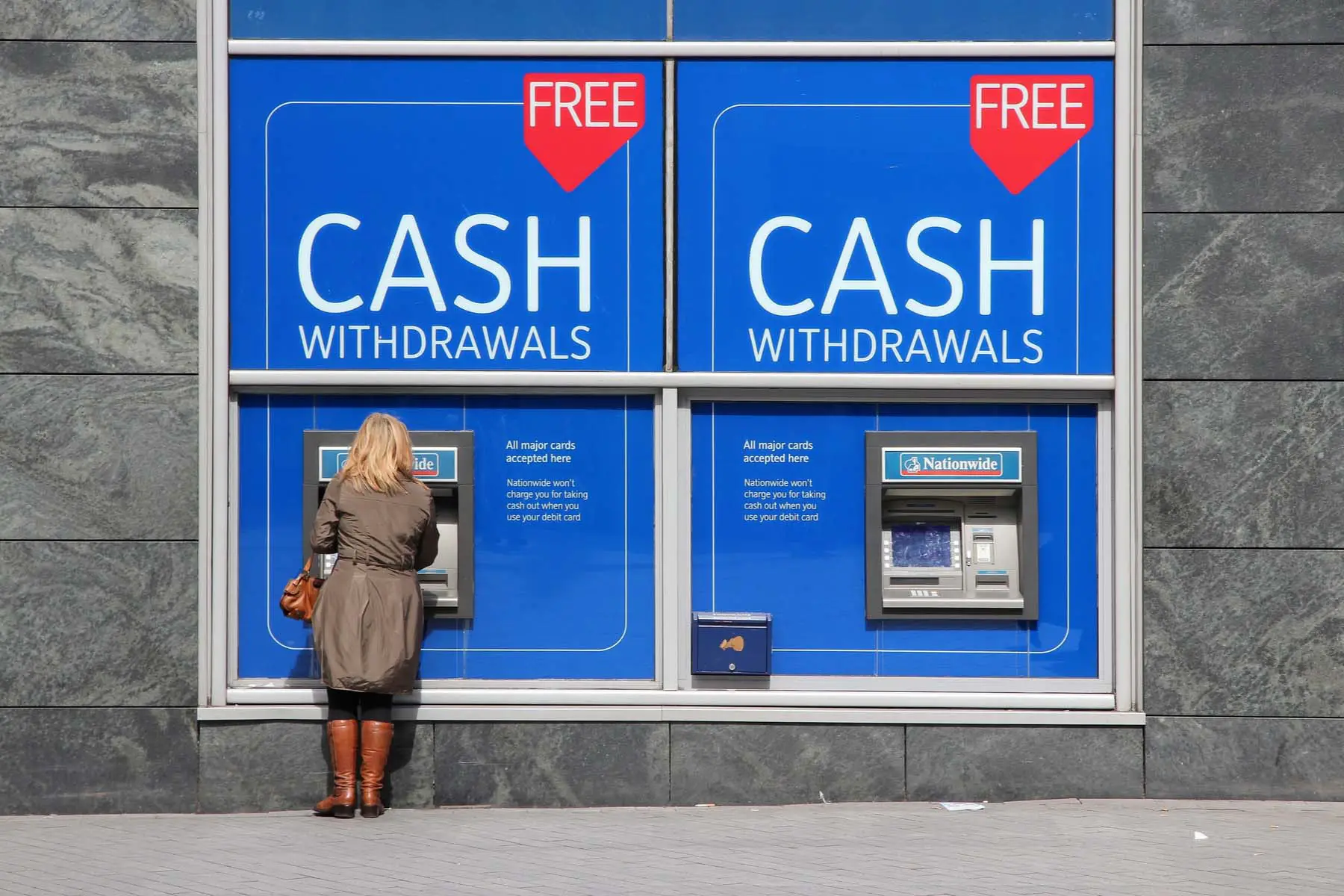 woman using Nationwide cash machine in Birmingham