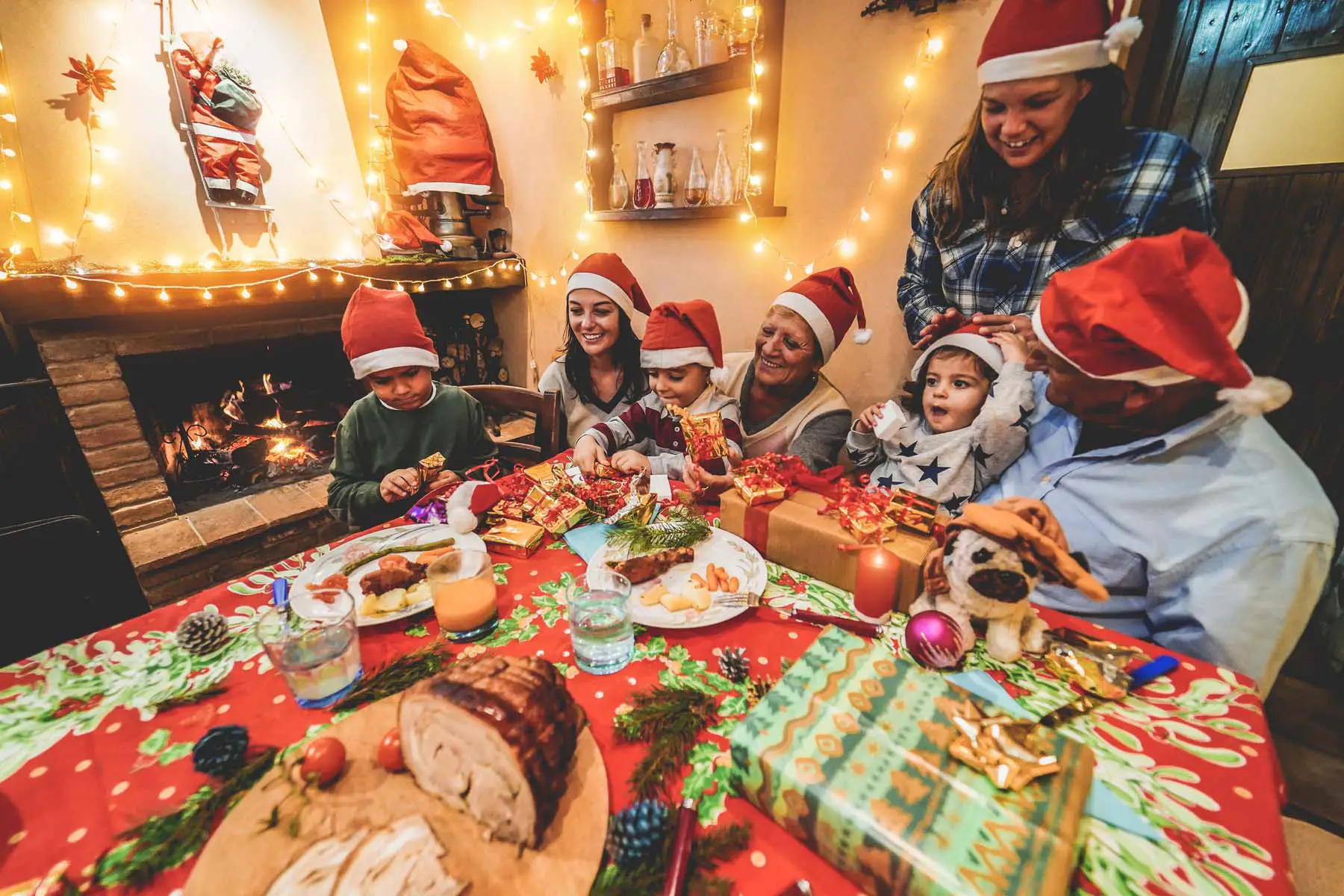 family enjoying Christmas dinner in the UK