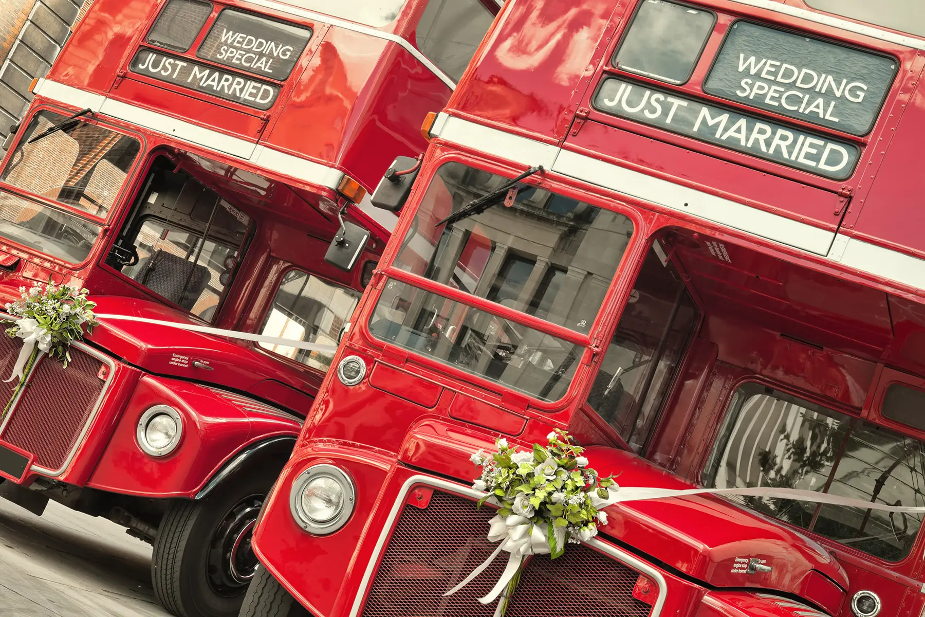 Double decker bus with just married signs