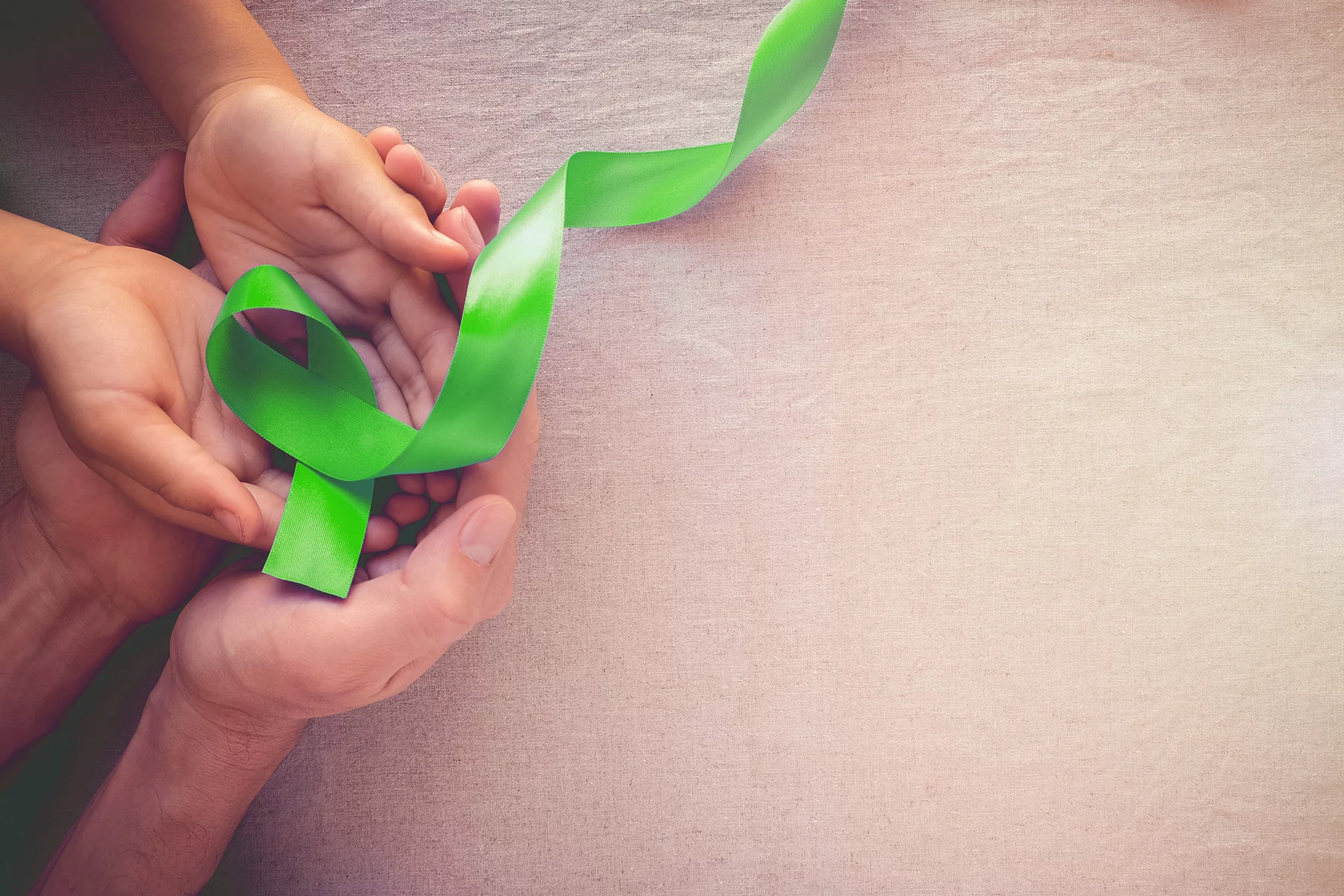 Mental Health Awareness Week green ribbon