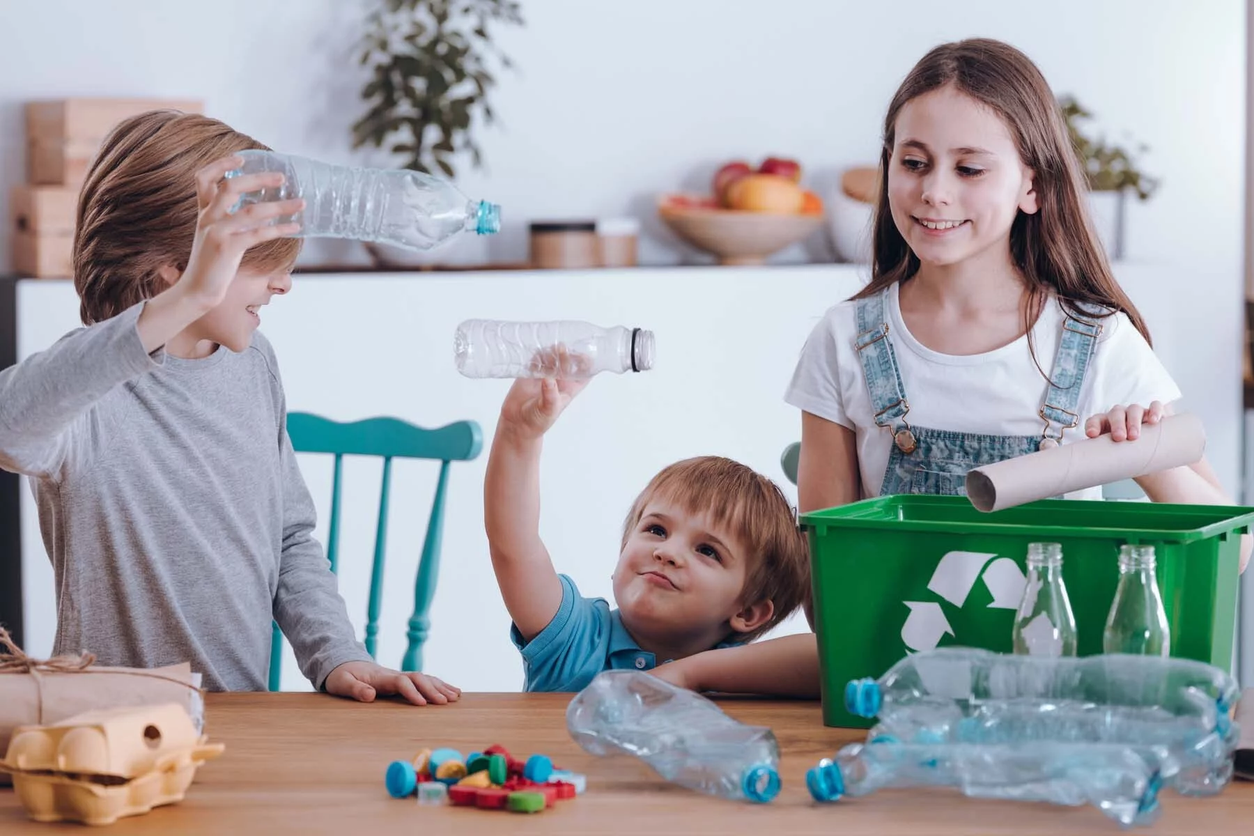family sorting recycling in UK