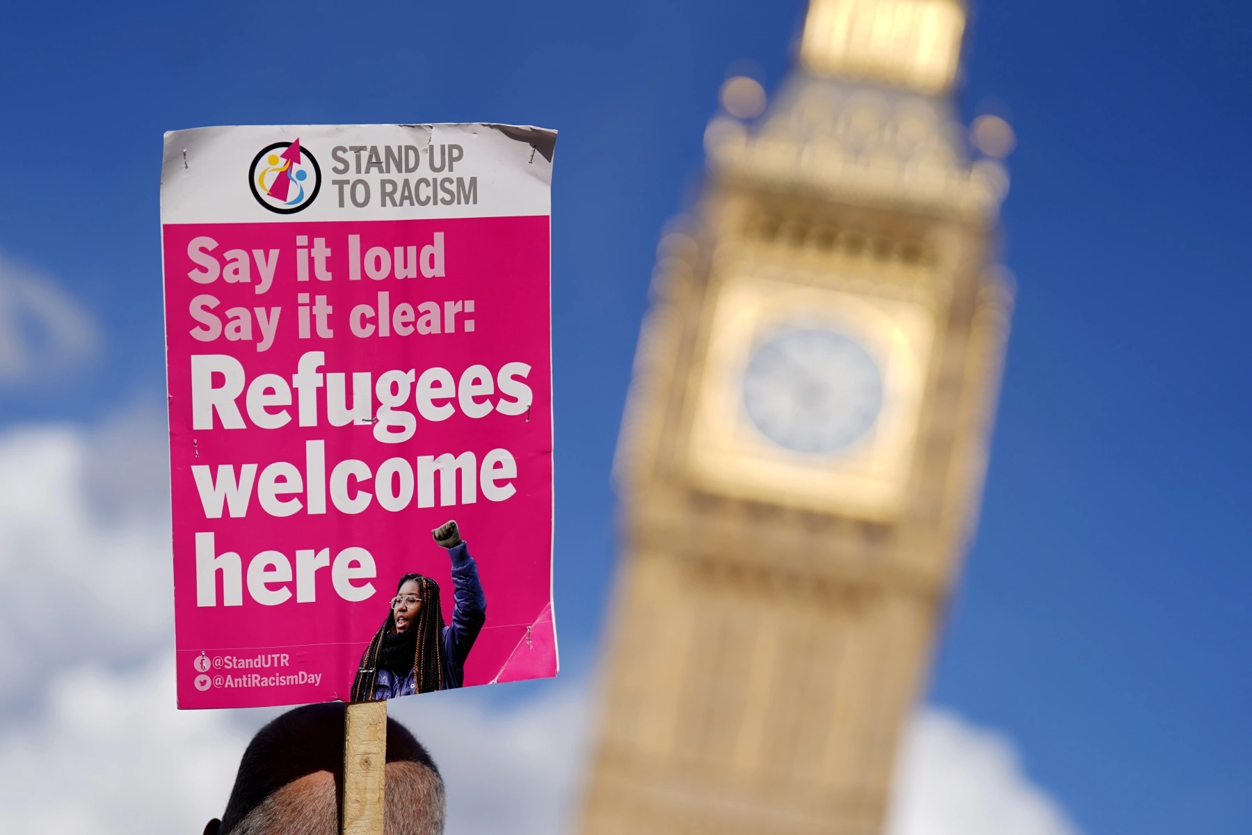 Placard protest sign advocating for refugee rights in London