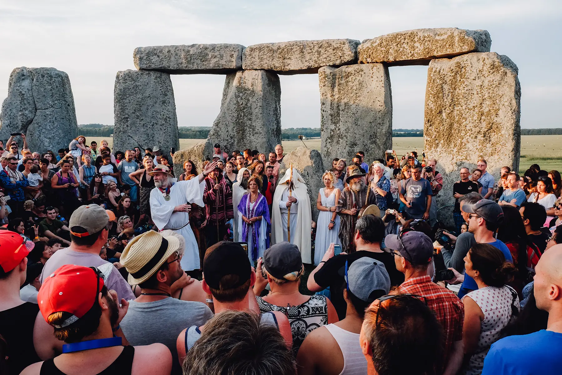 A crowd celebrating the summer solstice at Stonehenge