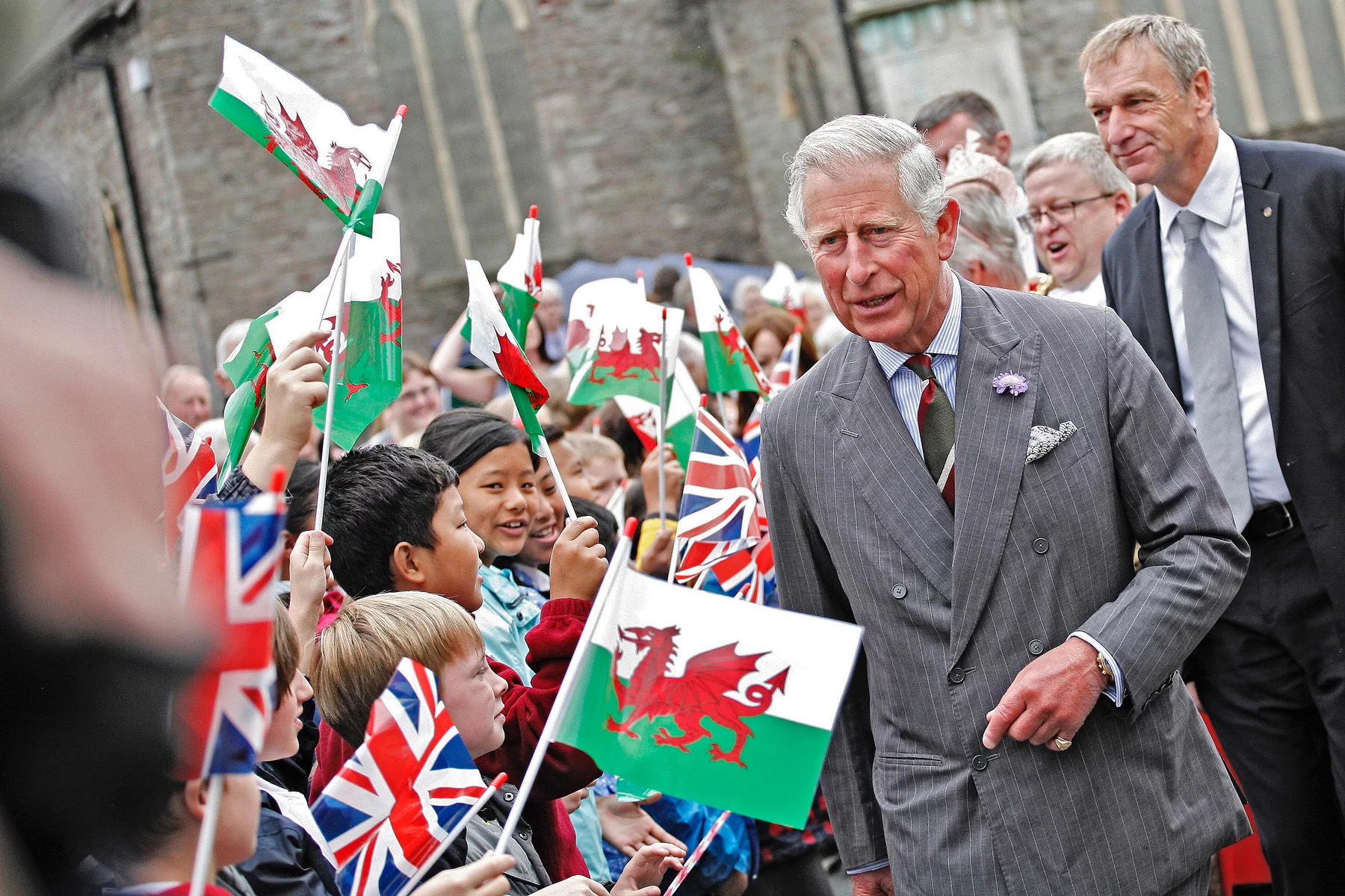 Primary students welcome the Prince of Wales in Brecon, Powys, Wales