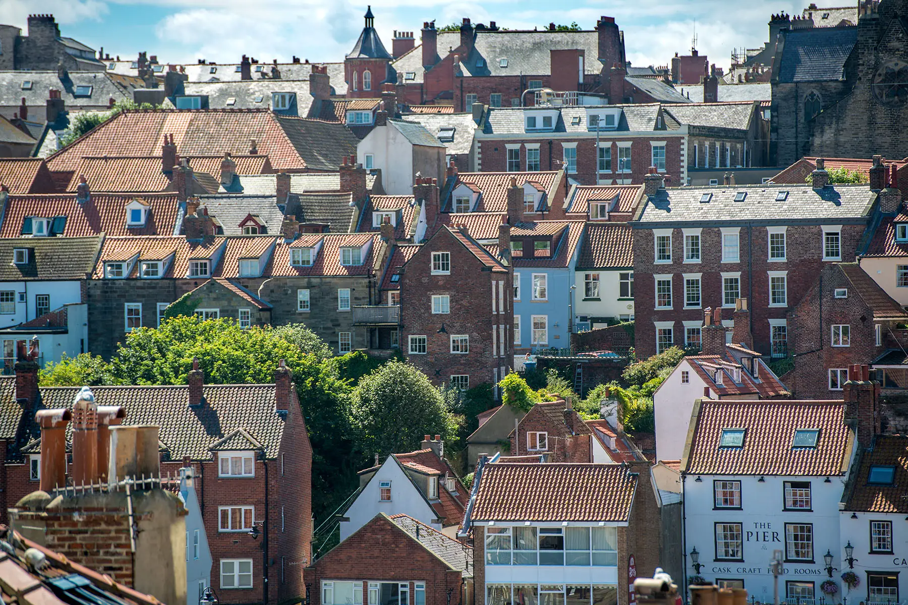 City scape of tightly arranged row houses, Whitby, Yorkshire, UK