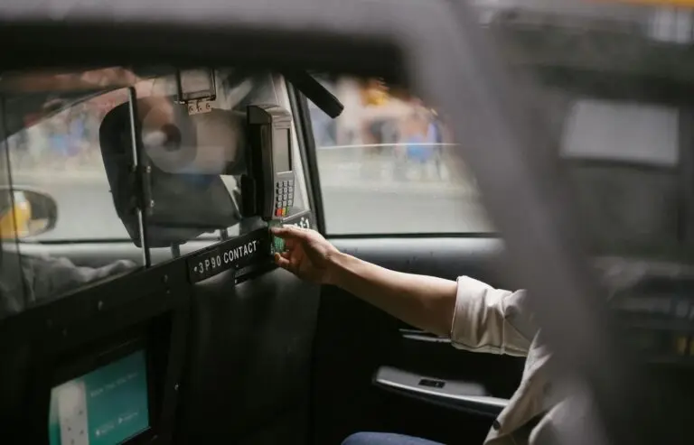 Paying by card in the back of a cab