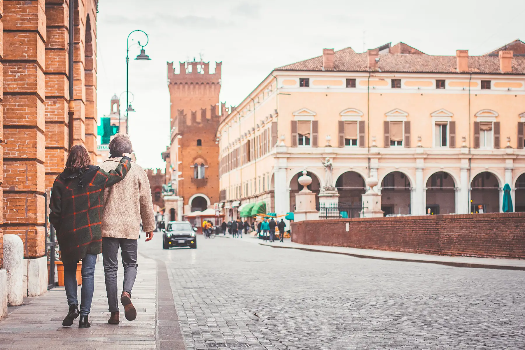 Couple walking in Ferrara