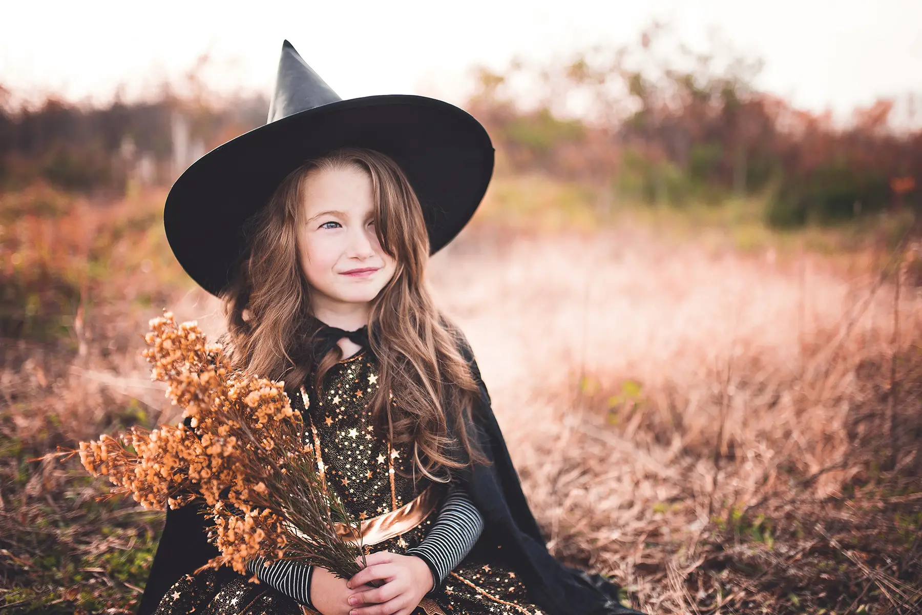 Girl in a witch costume