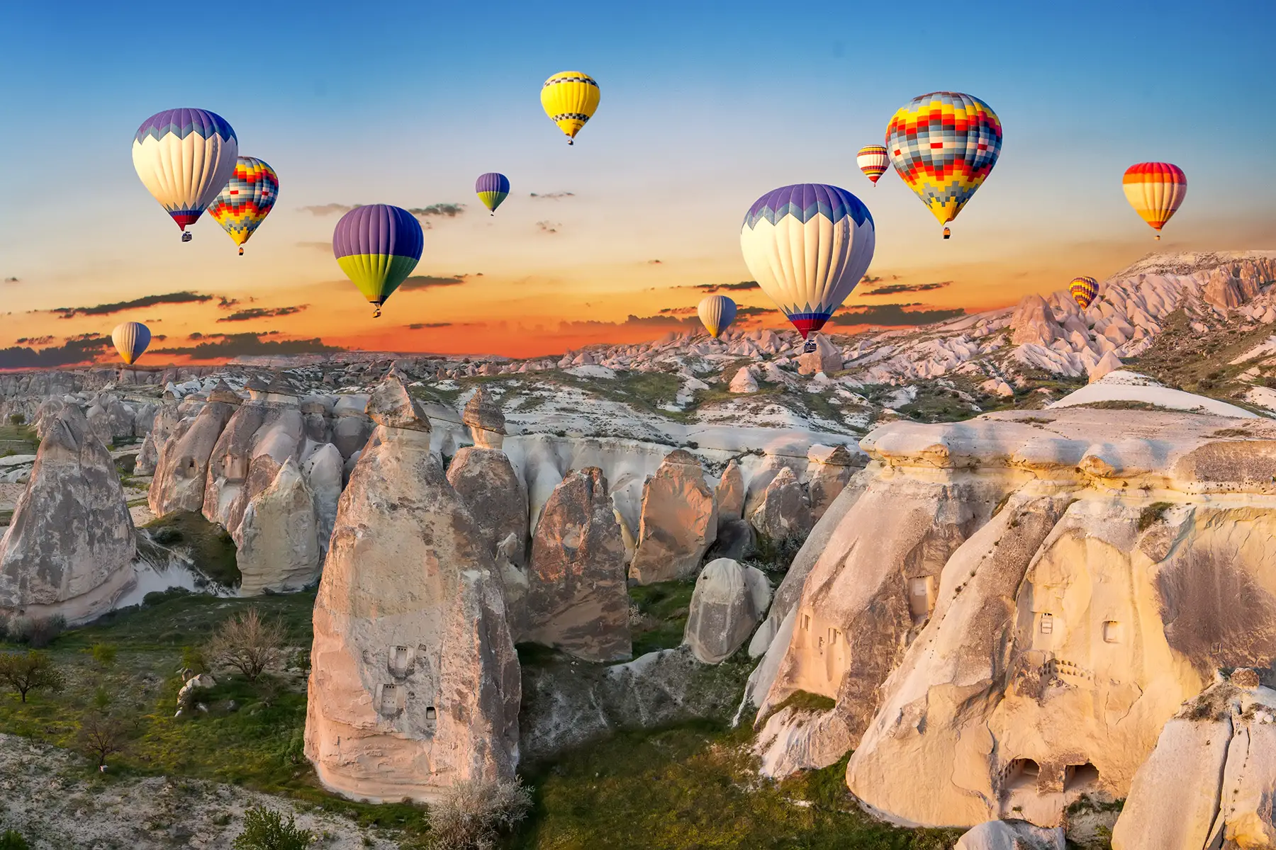 hot-air balloons flying over Cappadocia in Turkey