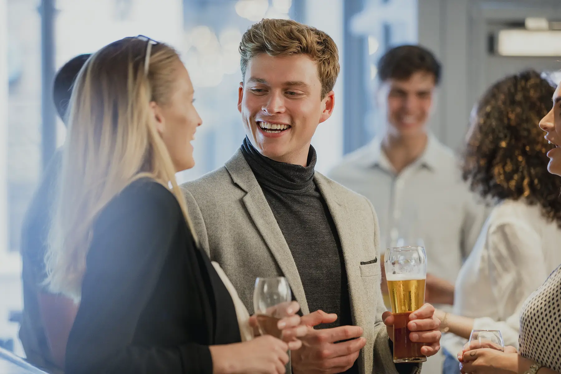 A group networking over drinks