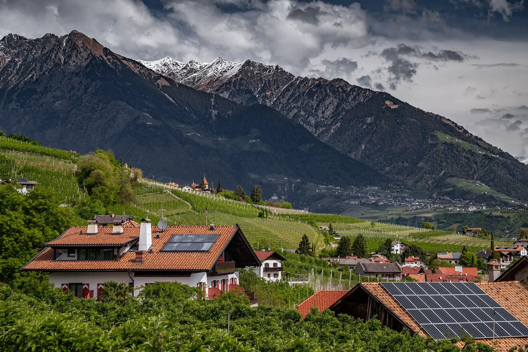 Solar panels on houses in the Dolomites in Italy