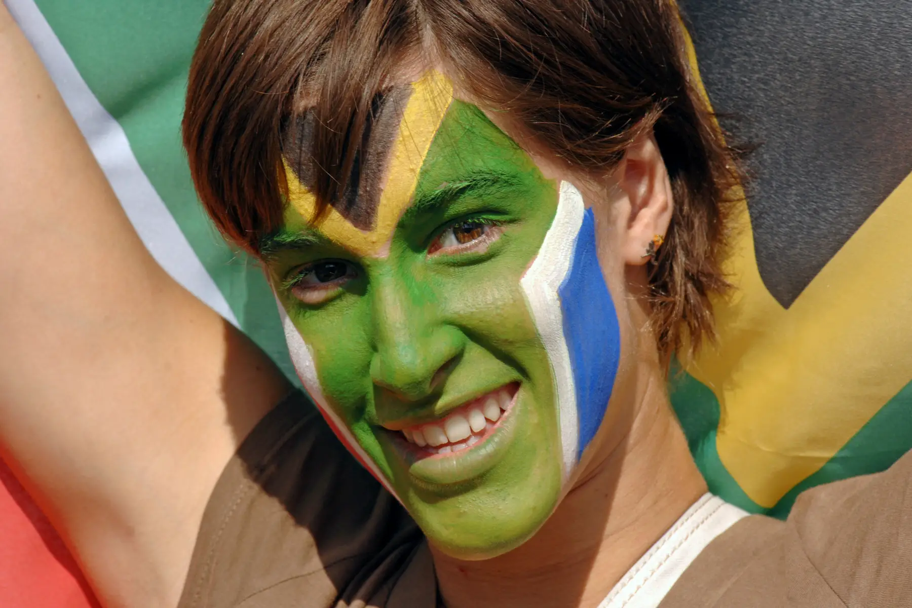 South African woman with her face painted