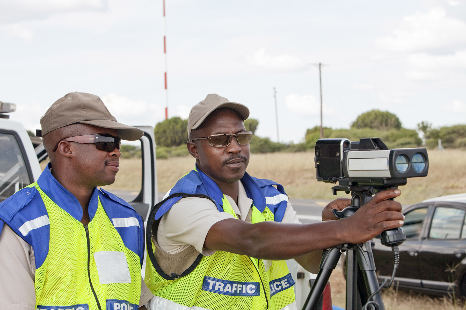 Traffic officers monitoring speed with a camera in South Africa