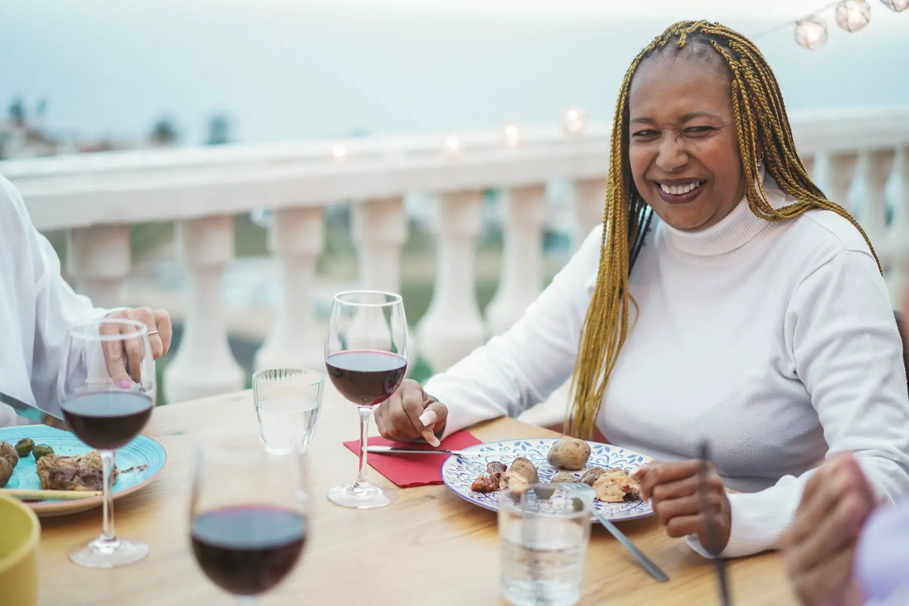 woman pairs wine with meal in South Africa