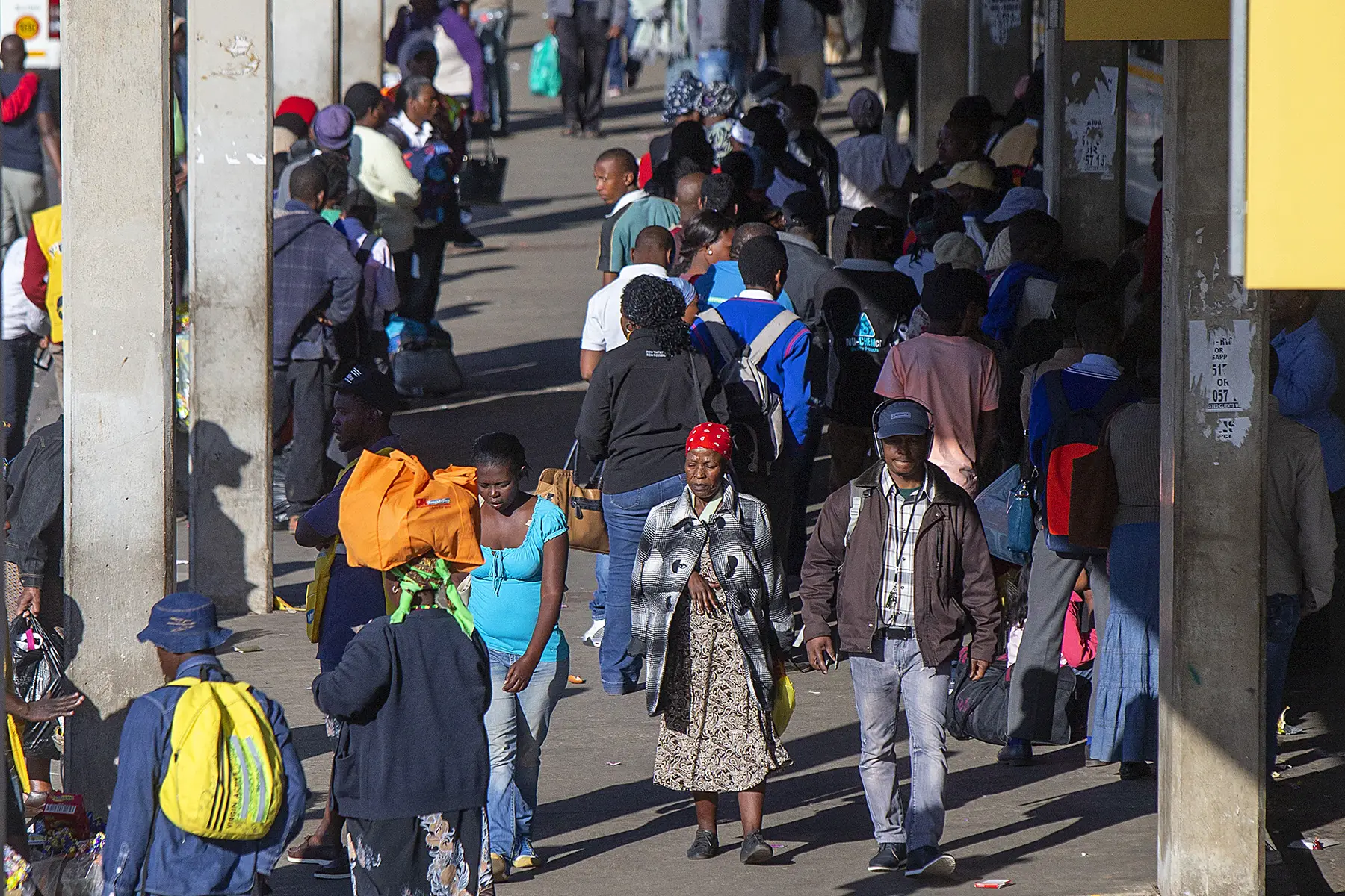 Commuters at a taxi station in Johannesburg