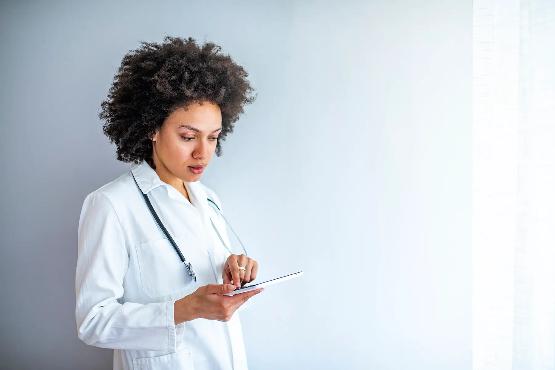 Female doctor examining charts