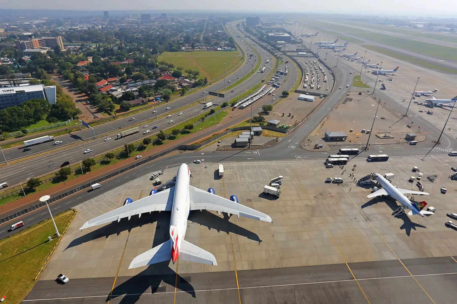 planes on the runway at Johannesburg's OR Tambo airport