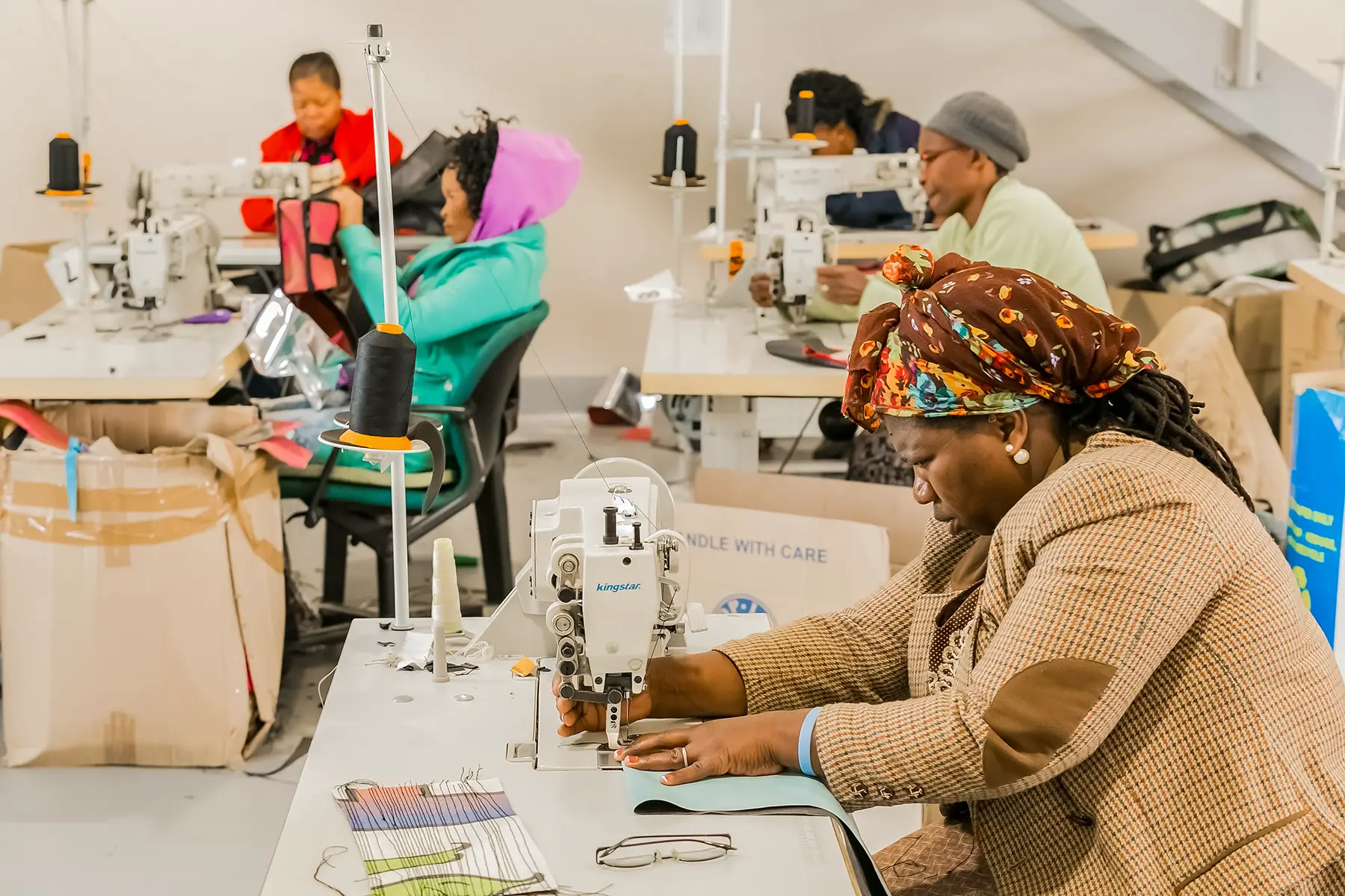 Seamstresses preparing garments in South Africa