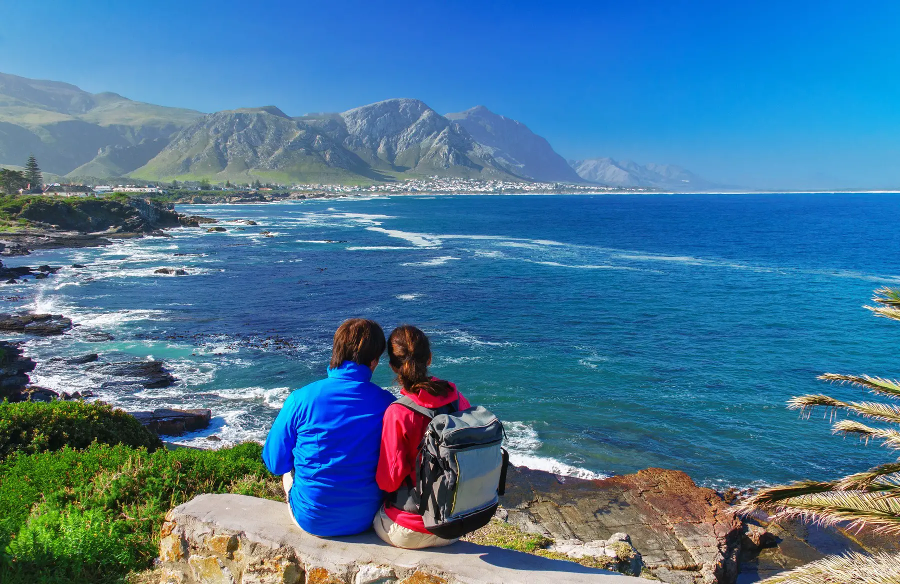 couple looking at the coastline in South Africa