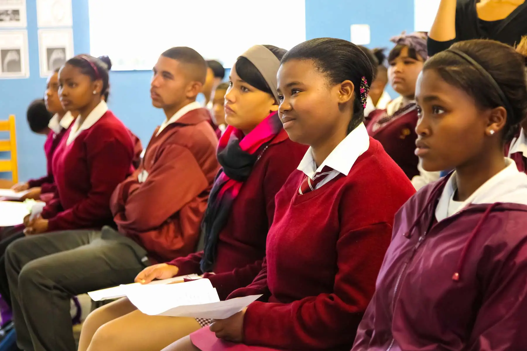 classroom in South Africa with students listening to teacher