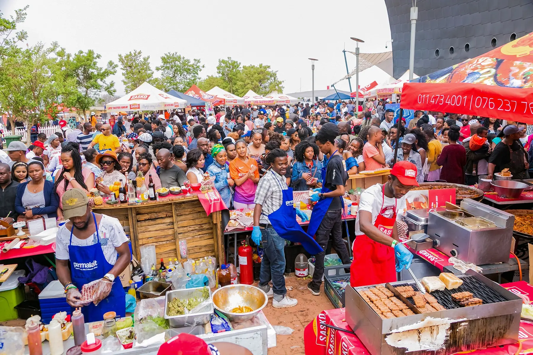 Diverse group of South Africans at an open-air food festival