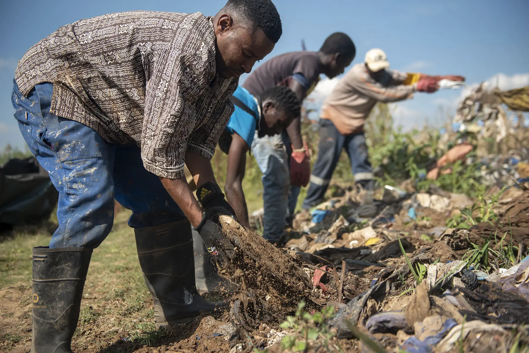 Volunteers cleaning litter from a wetland in Ekurhuleni, South Africa